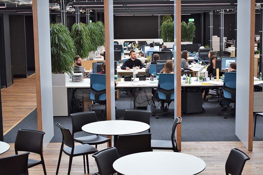 Corporate: Glasgow Architect’s studio has lush live plants and greenery bringing the outdoors in and screening open plan office