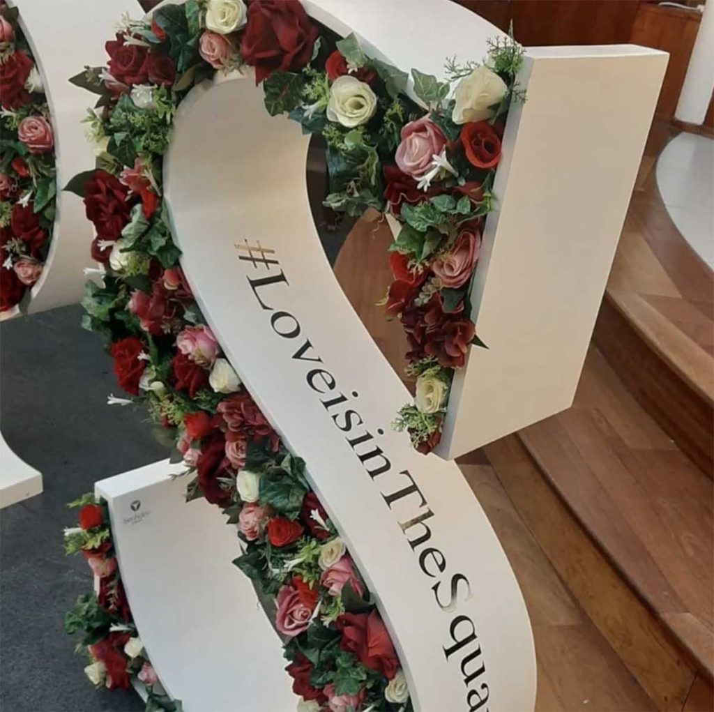 Princes Square shopping centre oversized letters filled with artificial flowers to create a valentines backdrop