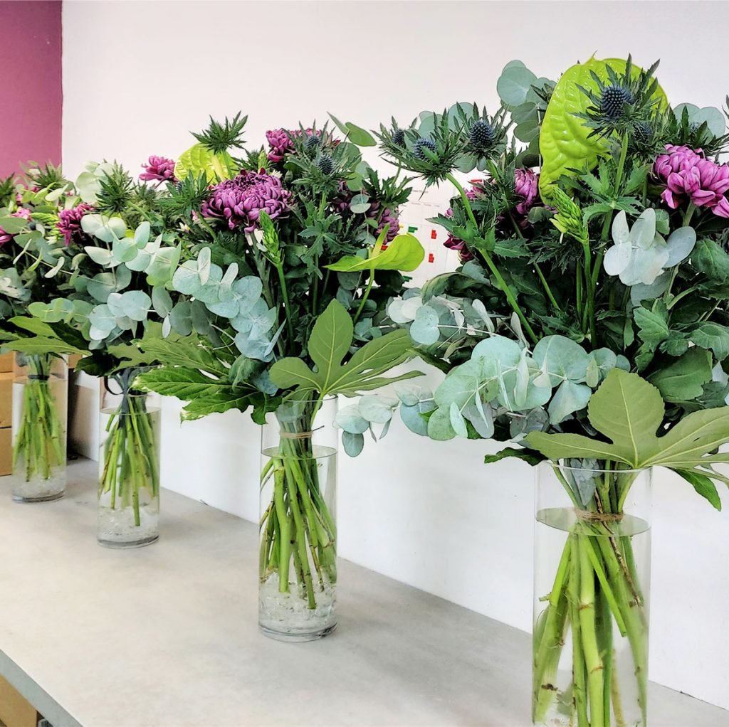 fresh flower displays for hotel rooms, featuring scottish flowers e.g. thistles, chrysanthemums, anthuriums and eucalyptus