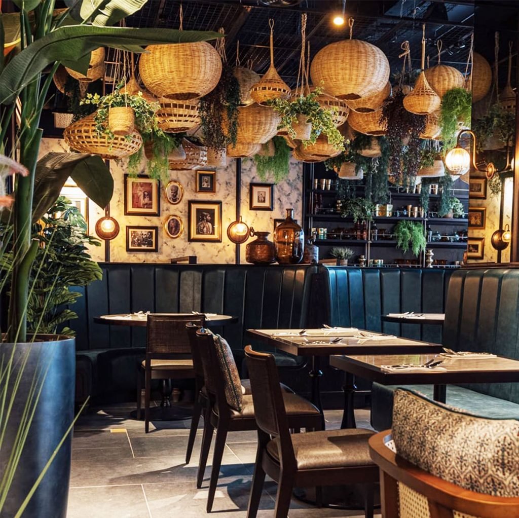 This beautiful Indian restaurant looks spectacular with the green plants decorating the light fittings on the ceiling.