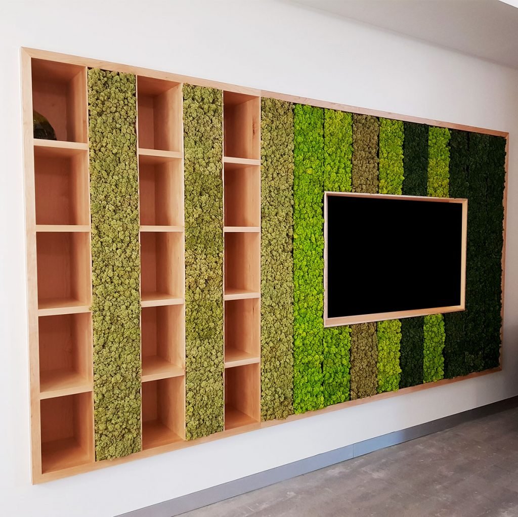 This Nordik moss panel wall combines striking design and storage solutions, seamlessly transforming a plain wall of shelves into a feature within the room.