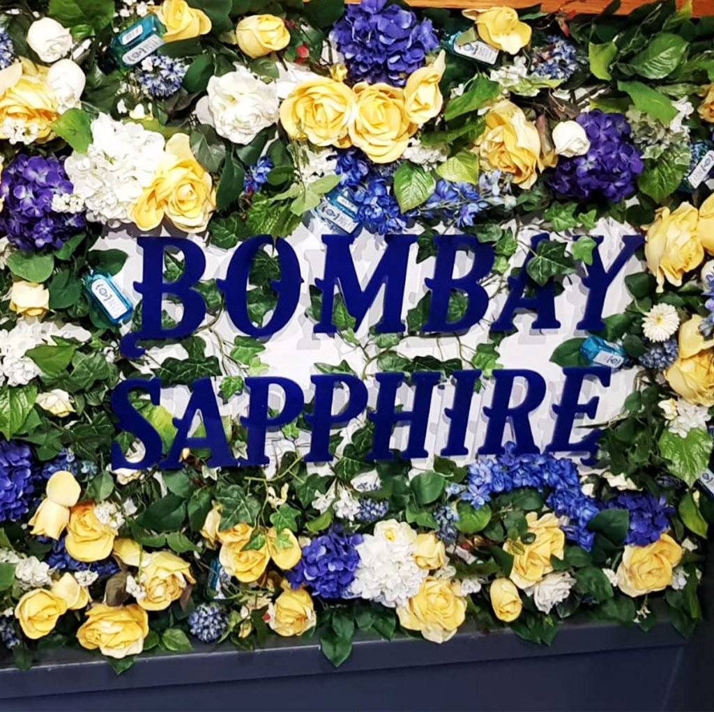 Blue and yellow flower wall panel created to display the Bombay sapphire brand