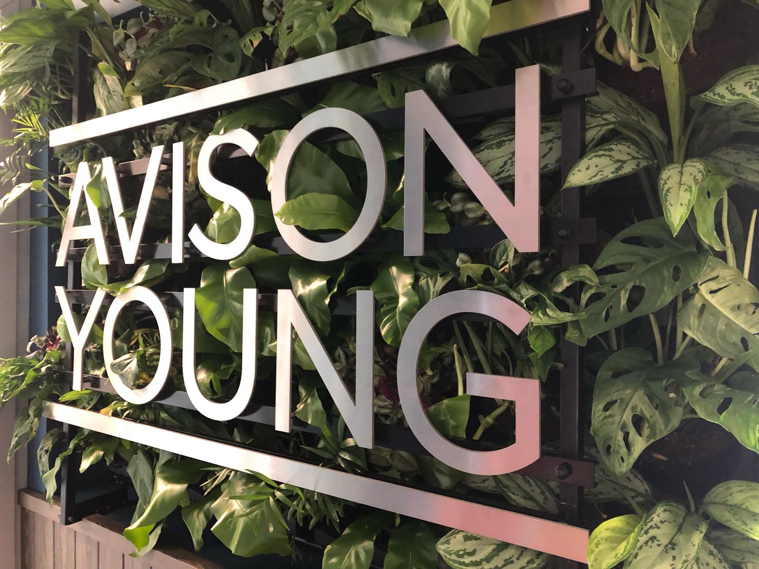 Avison Young living wall with sign