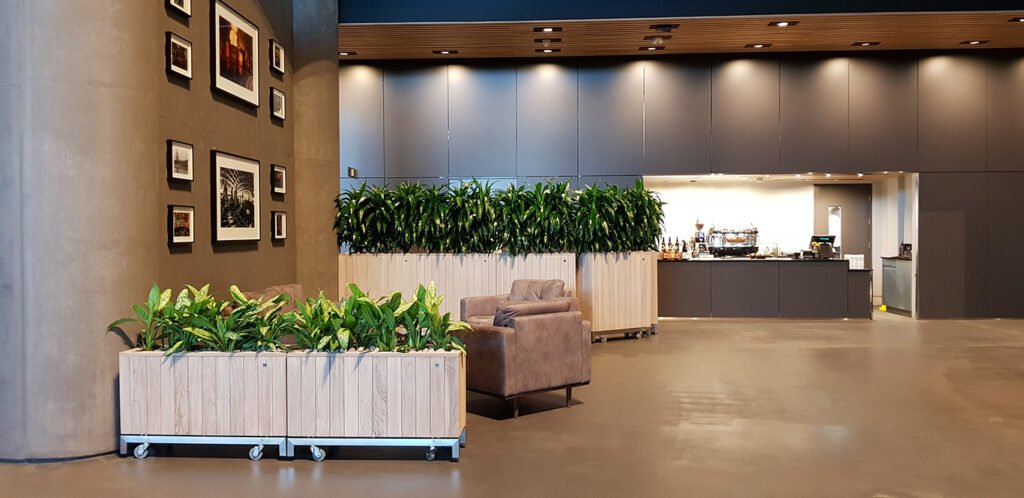 These trough planters on wheels bring life to big spaces.