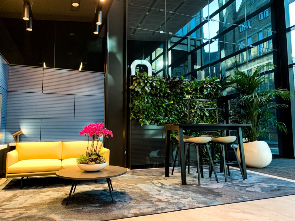 A thriving living wall decorates this corporate space