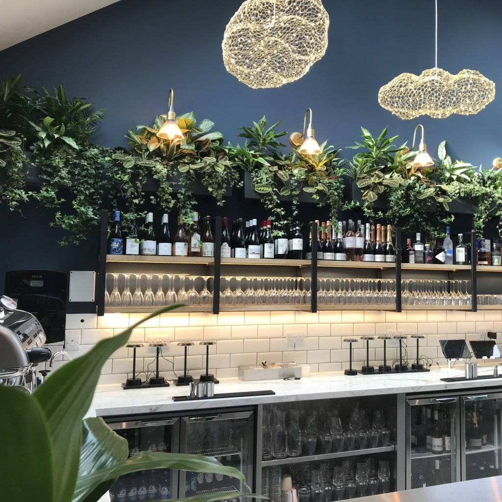 Black trough planters line the bar at Nick Nairn's restaurant in Bridge of Allan, Stirling