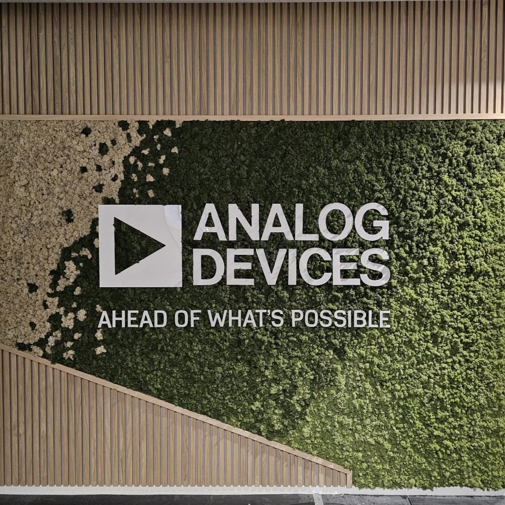 A stunning gradient reindeer Nordik Moss wall with branding for Analog Devices