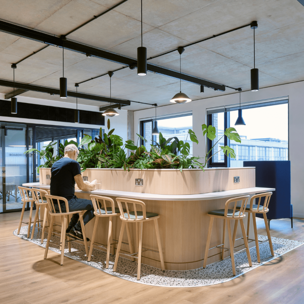seating-display-with-a-bespoke-planter-filled-with-mixed-live-planting-at-Element